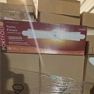 Portfolio Vanity Fixture with Frosted Glass Shade